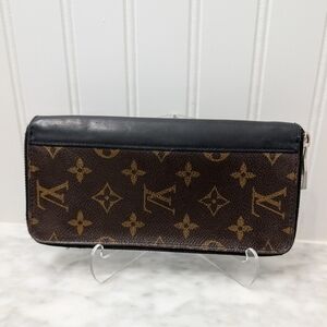 Authentic Louis Vuitton Monogram Macassar Vertical Zippered Wallet
